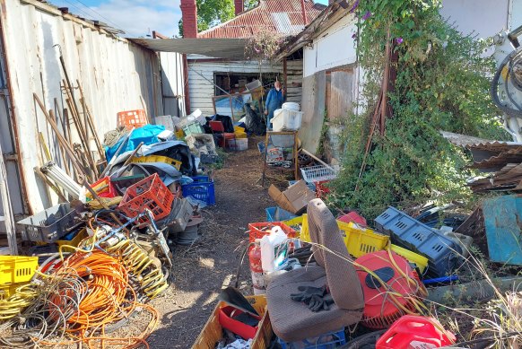 Nine skip bins of rubbish were removed from the property before it was listed.