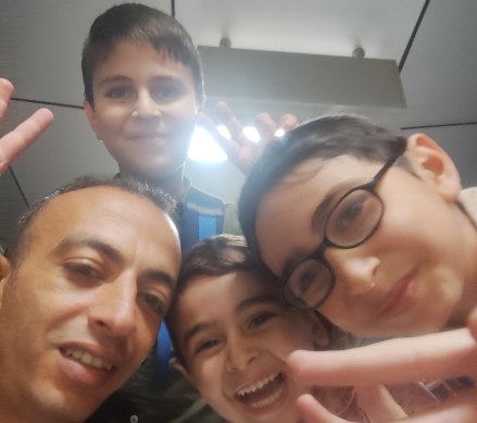 Ali Alalawi and his children Ziyad, Mohammed and Yazan, on the journey to Australia.