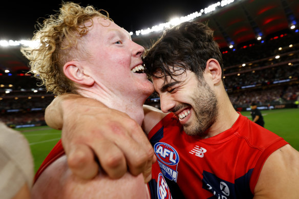 Midfield bulls Christian Petracca (right) and Clayton Oliver embrace.