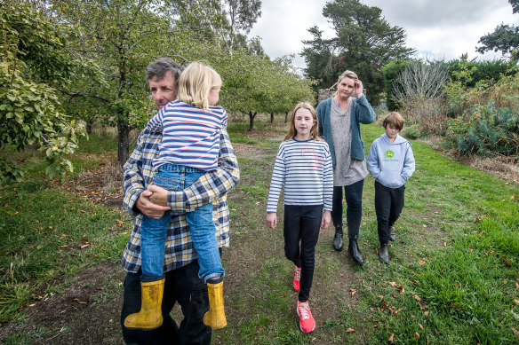 Richard and Tracey Haynes, pictured with their children Elizabeth, William and Andrew, have picked work on a farm and at a supermarket while stood down from Virgin. 