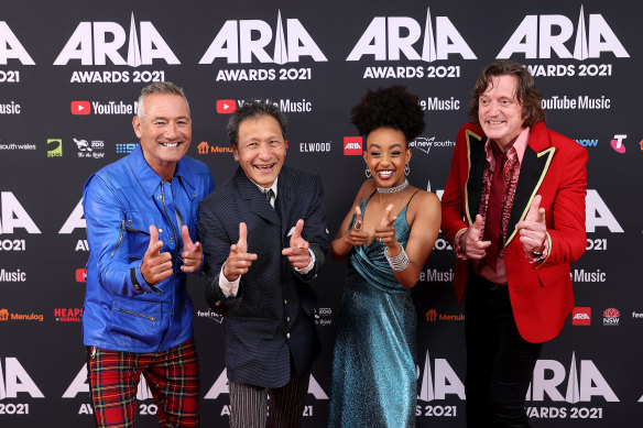 Tsehay with the OG Wiggles: Anthony Field, Jeff Fatt and Murray Cook at the 2021 ARIA Awards.