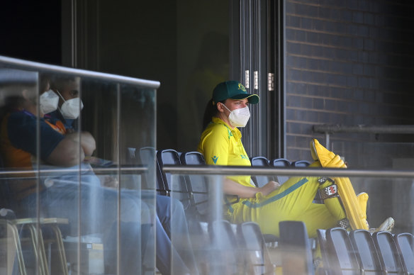 Tahlia McGrath looks on before her innings after testing positive to COVID earlier in the day.