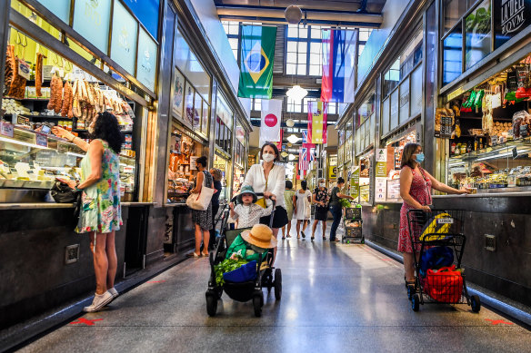 Shoppers in the Queen Victoria Market on Friday