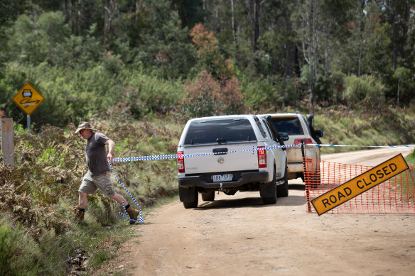 Forensic police near Dargo where the remains of the couple were found.