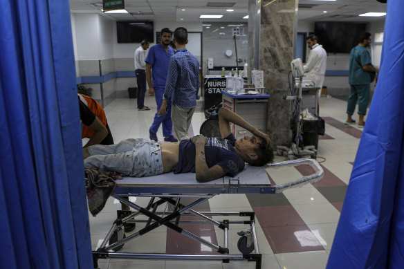 A wounded Palestinian boy in the emergency room of Al Shifa Hospital, following Israeli airstrikes on Gaza City on October 17. Israeli ground forces have since advanced on and searched the hospital.