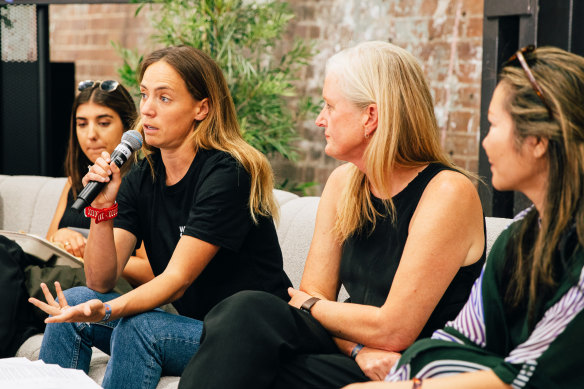 Laure Legros (holding microphone) says she regularly deals with people who feel dread a<em></em>bout climate change.
