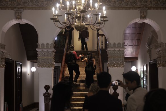 Students begin to arrive at Curzon Hall for the St Clare’s school formal.