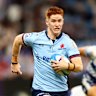 Sid Harvey on the charge against the Blues.