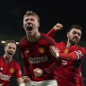 Rasmus Hojlund (centre) celebrates the goal that completed United’s remarkable comeback against Aston Villa.