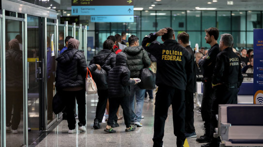 Brazilians who were deported from US walk through the departure lounge at Eduardo Gomes International Airport in Manaus, Amazonas state, on January 25, 2025.