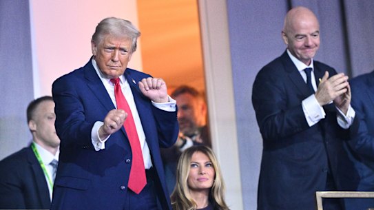 President Donald Trump dances at the end of the draw for the 2026 soccer World Cup at the Kennedy Center in Washington, Friday, Dec. 5, 2025. (Mandel Ngan/Pool Photo via AP)