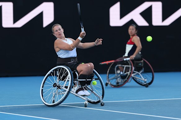 From left: Lucy Shuker of Great Britain plays a forehand as she pairs with Yui Kamiji of Japan in the women’s wheelchair doubles quarter-final against Macarena Cabrillana of Chile and Saki Takamuro of Japan.