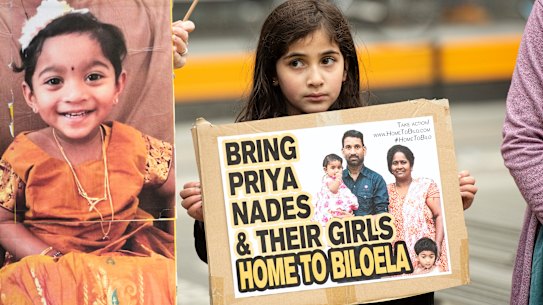 A young girl takes part in a rally supporting the family in Melbourne on Sunday.