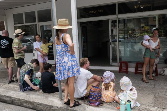 A mix of British expats and locals wait for their lunch order at Rosie’s.