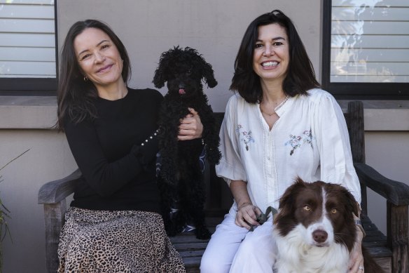 Genie Pepper and Lauren Healey share dogs and dog-sitting duties.