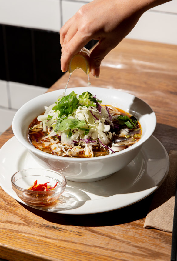 The bún bò huế beef noodle soup. 