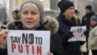 Activists hold posters during a SayNOtoPutin rally in Kiev, Ukraine, this month.
