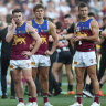 Dejected Brisbane Lions players after last year’s grand final loss.