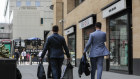 Men carry bags and suit carriers as they leave the offices of Deutsche Bank in London. It is difficult to see how any business can achieve long-term success when there is evidently so little bond between it and its employees. 