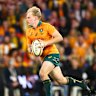 Tom Lynagh runs the ball back from a kick at Suncorp Stadium.