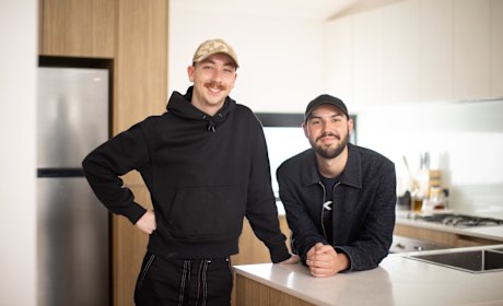 Tom Lander, left and partner Fergus McWhirter recently bought their first home in Fitzroy as house prices fell.