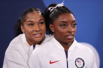 Jordan Chiles and Simone Biles of Team United States react during the women’s team final in Japan on Wednesday.