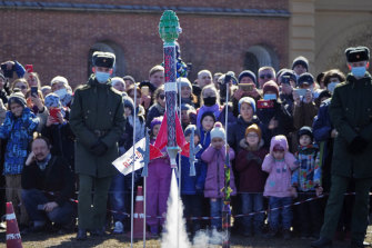 A model rocket shaped as a grenade is launched during a celebration of the 60th anniversary of Russia’s Yuri Gagarin’s first manned flight into space, in St Petersburg, Russia, on Sunday, April 11.