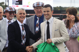 Robert and Luke Price with connections after Count De Rupee’s win in the 2021 Gong.