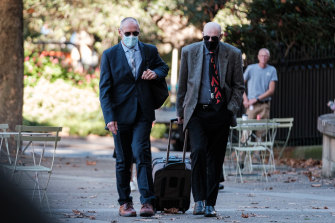 Chris Dawson (Left) outside the NSW Supreme Court on Wednesday, with his brother Peter.