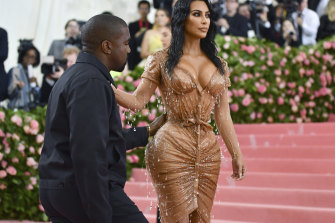 Reality TV star Kim Kardashian, pictured with then husband Kanye West, is considered one inspiration for many women seeking cosmetic surgeries in Australia.