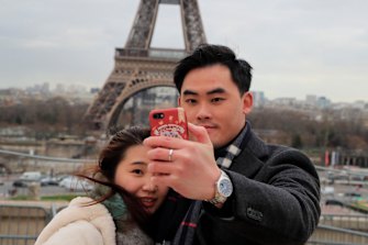 There are fewer Chinese visitors posing in front of the Eiffel Tower in recent weeks.