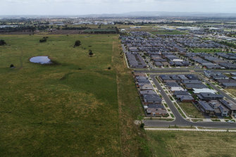 The land, to the left in this photo, in Cranbourne West that developer John Woodman and his associates tried to get Planning Minister Richard Wynne to rezone for housing.