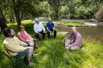 Catholic priest John Dupuche (in white) is a tantra meditation expert who started a multifaith ashram in Warburton. Among the visitors and residents are Cullan Joyce, Maree Santamaria, Sandy Kouroupidis and Andy Torpor. 