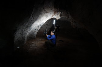 Andrea Jalandoni taking high-resolution photographs for use in photogrammetry at a rock art site in the Philippines. 