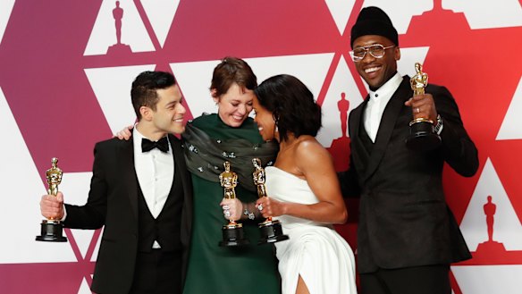 Acting Oscar winners ... Rami Malek (left) with Olivia Colman, Regina King and Mahershala Ali.