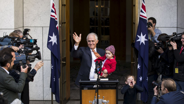 Malcolm Turnbull with granddaughter Alice and grandson Jack after speaking to the media on Friday.