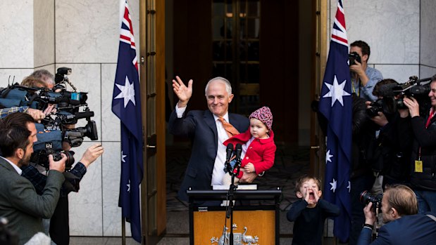 Malcolm Turnbull with granddaughter Alice and grandson Jack after speaking to the media on Friday.