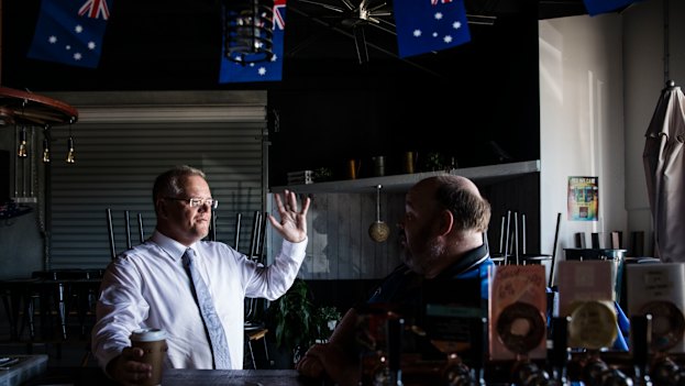 The Prime Minister speaks to Paul Metcalfe, the co-owner of the Crow n Arrow hotel in the Brisbane suburb of Lawnton.