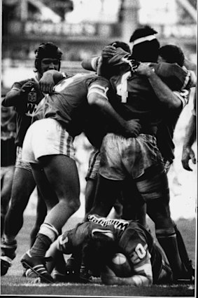 Raiding party: Steve Jackson lies sprawled in the in-goal after scoring the try that sealed Canberra's first premiership.