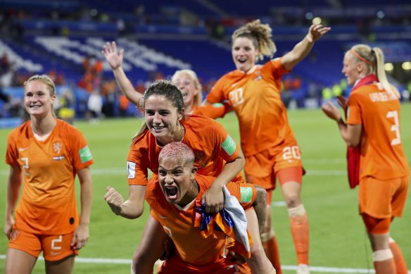Dutch players celebrate beating Sweden in the semi-finals.