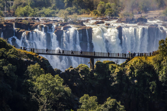 Bring your raincoat to Victoria Falls,  Africa, on the border between Zambia and Zimbabwe.