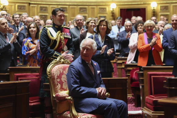 French lawmakers from both the upper and the lower houses of parliament applauded King Charles before his address at the French Senate on September 21.