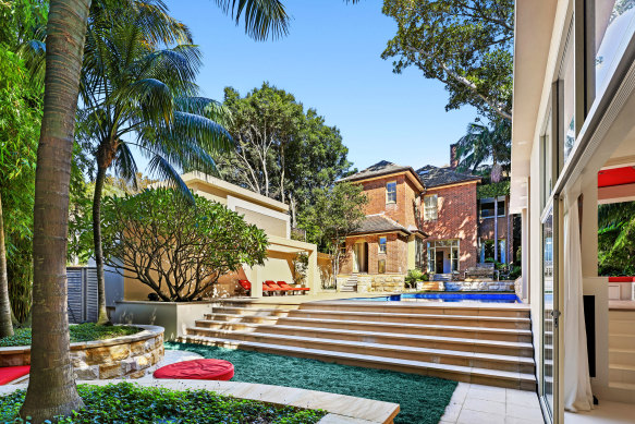 Denholm’s swimming pool now comes with an outdoor cinema and separate guest blocks flanking the garden.