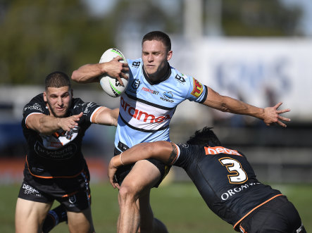 Coming through ... Luke Metcalf bagged a double last Saturday in the 50-20 win over the Wests Tigers.