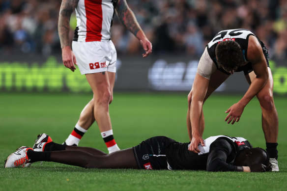 Aliir Aliir after his was dumped in a tackle by Jack Higgins.