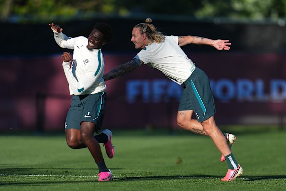 Mohamed Toure (left) and Jackson Irvine. Popovic says Toure will be fit for Sunday’s clash.