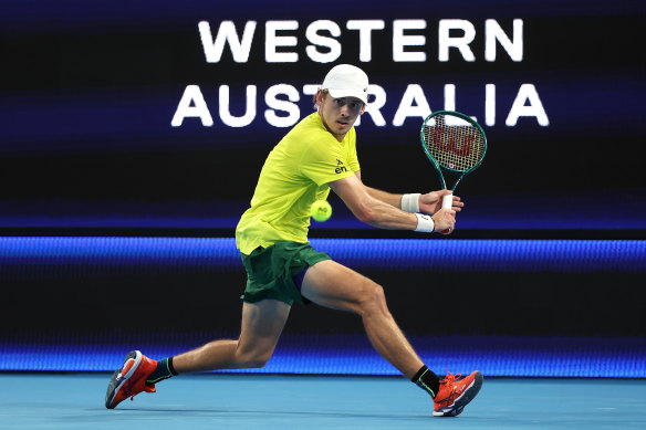 Alex de Minaur of Team Australia plays a backhand in his singles match to Cameron Norrie of Team Great Britain.