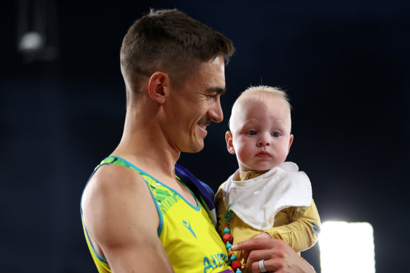 Silver medal winner Brandon Starc of Team Australia with son Oli.
