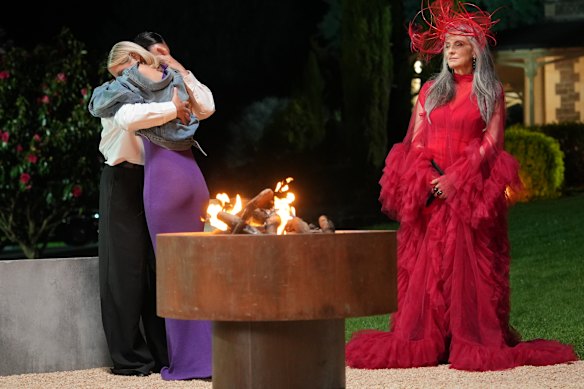 Kirby Bentley hugs fellow contestant Keira Maguire after Bentley revealed she was a Traitor.