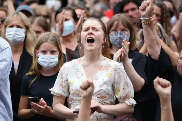 Protestors shout in Brisbane during the March 4 Justice rally. 